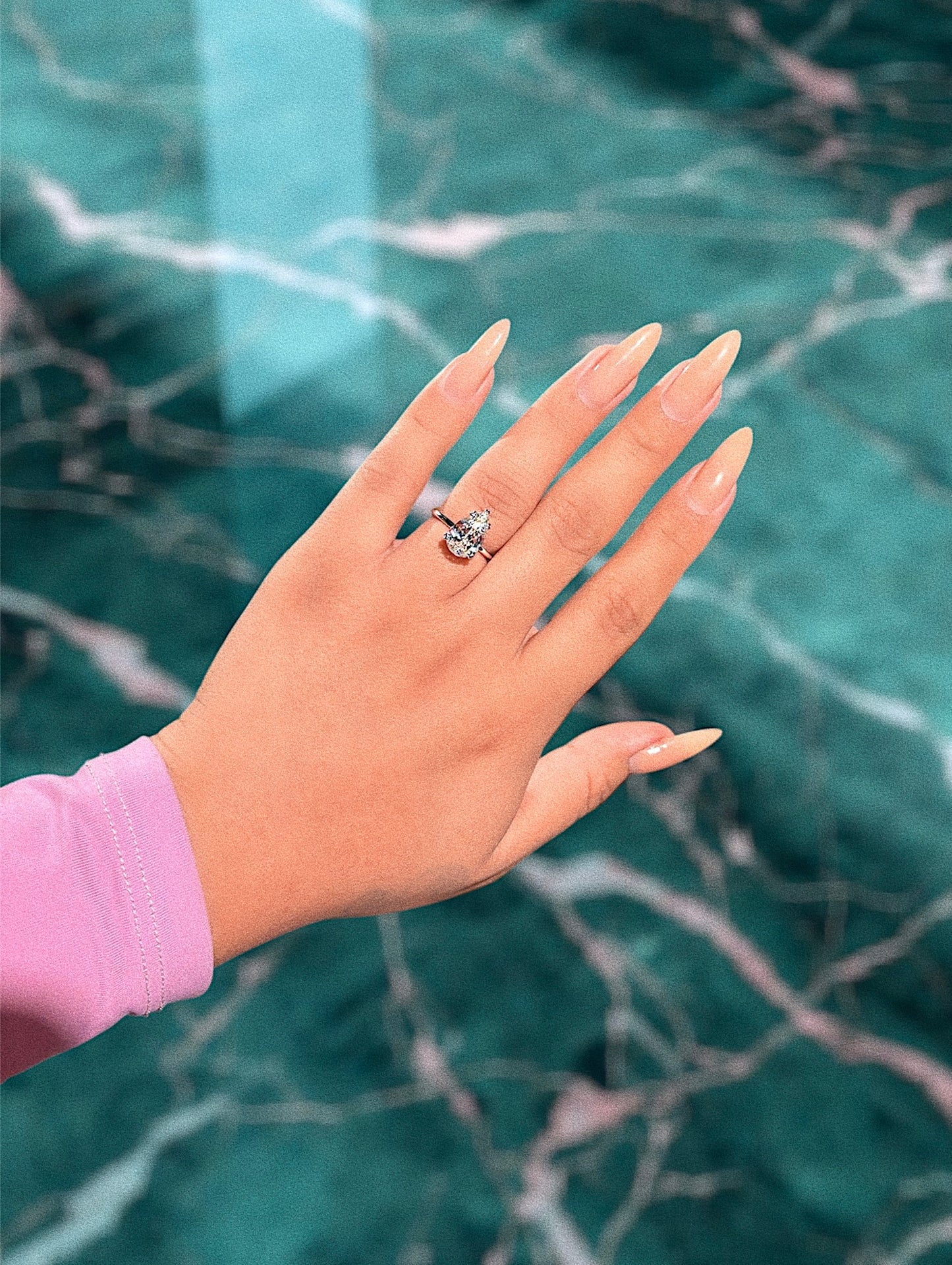 Classic pear solitaire ring